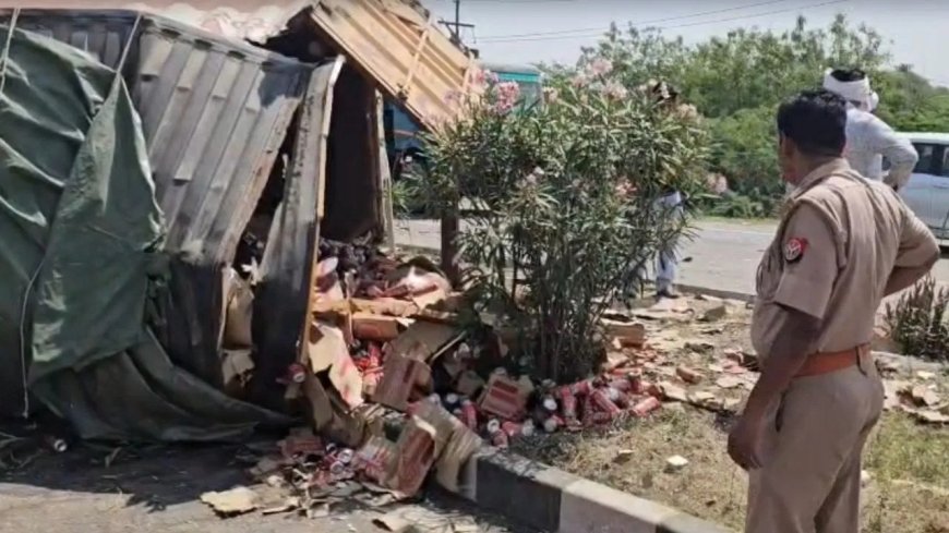 झांसी हाईवे पर भीषण टक्कर, बीयर कंटेनर और मिर्ची ट्रक की भिड़ंत से मचा हड़कंप